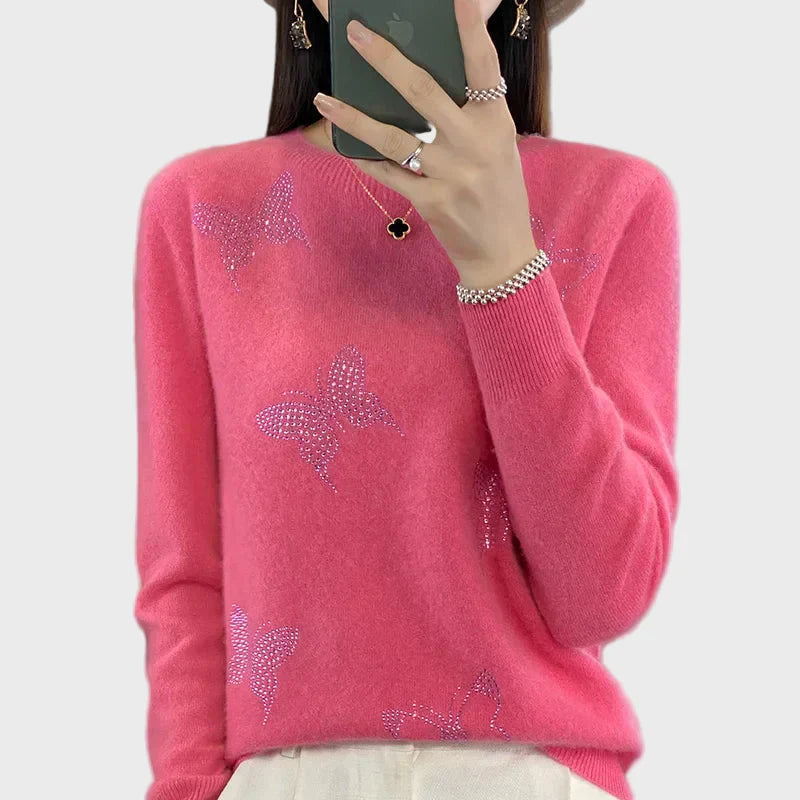 Pletený rolák s motivem motýlů