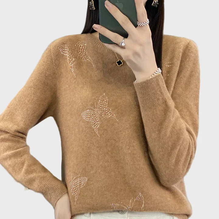 Pletený rolák s motivem motýlů