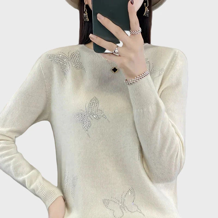 Pletený rolák s motivem motýlů