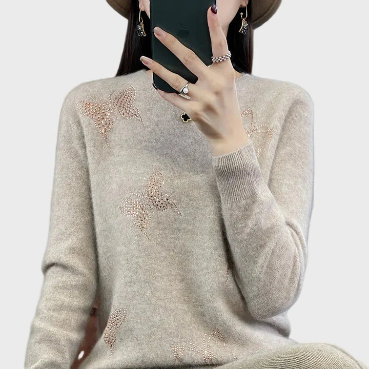 Pletený rolák s motivem motýlů