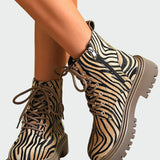 Kozačky se šněrováním v zebra designu