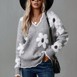 Mette – elegantní svetr s výstřihem do v a květinovým vzorem