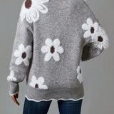 Mette – elegantní svetr s výstřihem do v a květinovým vzorem