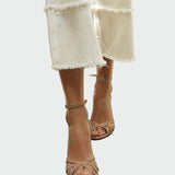 Pumpy s podpatkem a křížovými řemínky