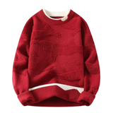 Svetr s texturovaným vzorem v abstraktním stylu