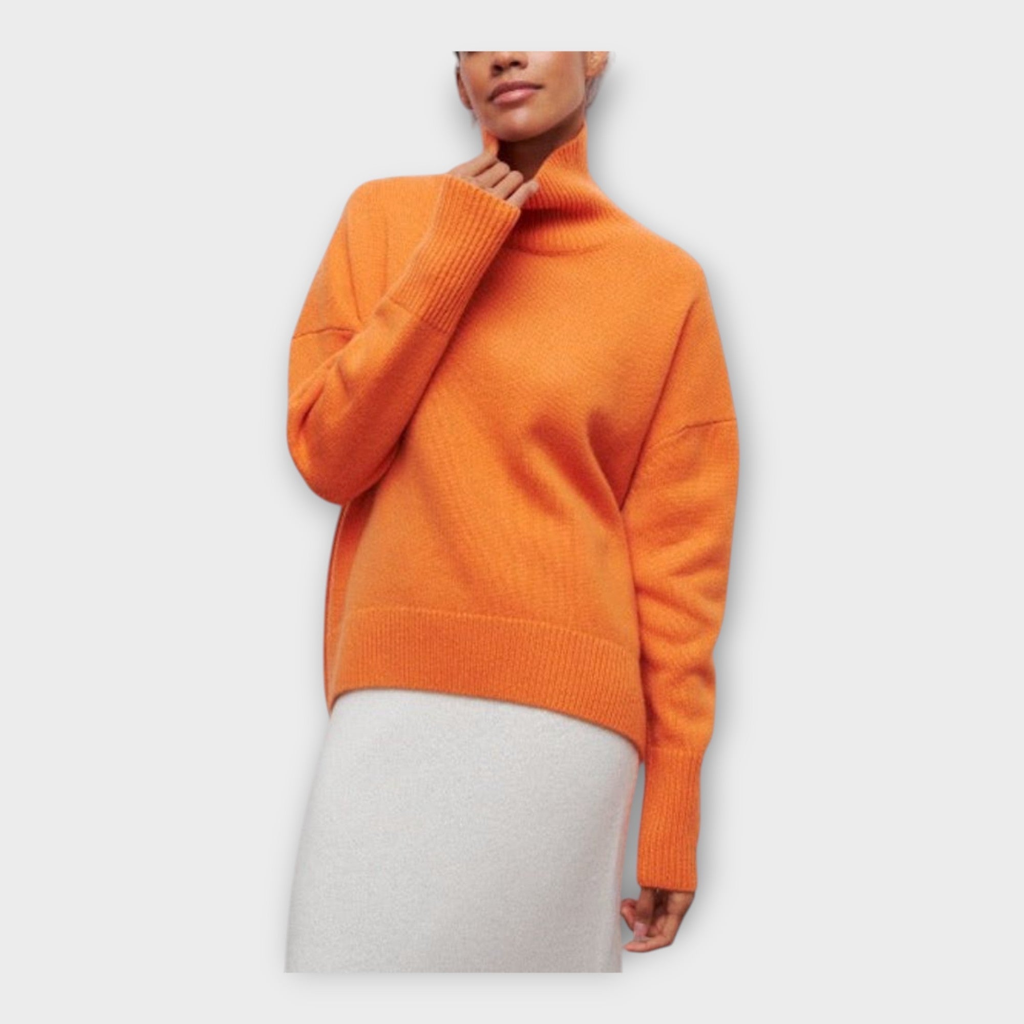 Pletený svetr s vysokým límcem