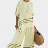 Overal s širokými pruhy a asymetrickým střihem - moderní a pohodlný styl