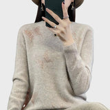 Pletený rolák s motivem motýlů