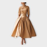 Midi-kjole s minimalistickým rafinovaným