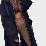 Dlouhý kabát s kapucí