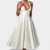 Midi šaty s otevřenými zády a stylovým korzetem