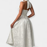 Midi šaty s otevřenými zády a stylovým korzetem