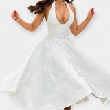 Midi šaty s otevřenými zády a stylovým korzetem