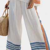 Bílé etnické soupravy Daisy s modrými a oranžovými detaily – jedinečný a živý styl