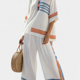 Bílé etnické soupravy Daisy s modrými a oranžovými detaily – jedinečný a živý styl